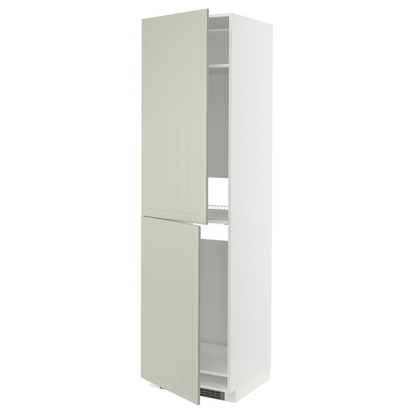 Displays a tall, green, METOD kitchen cabinet with light green stensund doors and a white frame, featuring a modern and crafted look.