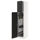 A white METOD kitchen cabinet with black upplöv doors open, revealing storage and organizers.
