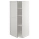 Open METOD kitchen cabinet with adjustable shelves and light grey fronts.