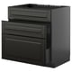 A black METOD kitchen unit with multiple drawers and a cabinet, featuring a sleek modern design.