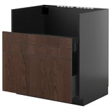 Modern kitchen cabinet, dark brown wood, black frame, three drawers with solid wood edges.