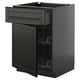Modern black kitchen unit with beveled edges, metal baskets, and smooth drawer, METOD series.