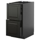 Black METOD kitchen cabinet with two bevelled drawer fronts and a pull-out drawer, sleek and modern design.
