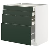 Modern METOD kitchen cabinet with white paint and green drawers, sleek design, four full-extension drawers.
