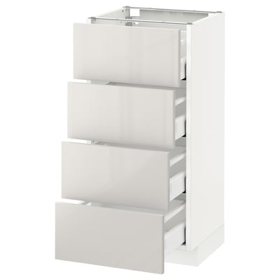 White METOD storage unit with four grey smooth drawer fronts.