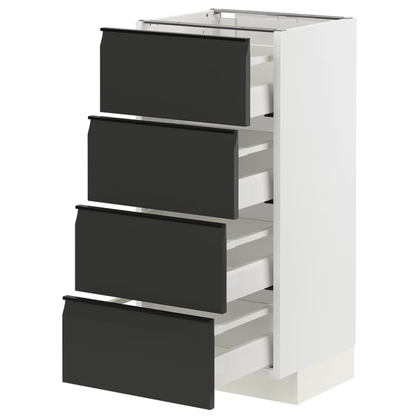 Modern black and white kitchen cabinet with four drawers and sleek handles.