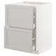 White METOD kitchen cabinet with beveled drawers and shelves.