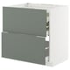 A grey-green ikea METOD kitchen cabinet with two open drawers, displaying organizer inserts.