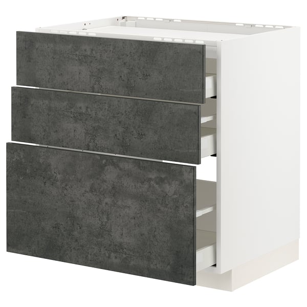 Modern dark grey concrete kitchen cabinet with three large drawers.