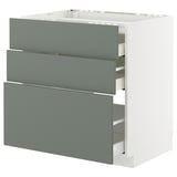 Modern grey-green kitchen cabinet with three pull-out drawers, minimalist design.