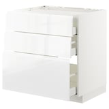 This image shows a white METOD kitchen cabinet with three drawers. The modern design smooth, glossy surfaces and integrated handles.