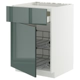 Modern kitchen cabinet with grey-green glossy drawer, wire shelves, white base.