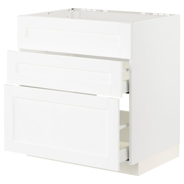 White METOD kitchen cabinet with wooden texture and smooth drawers.