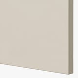 Smooth, beige kitchen cabinet front with sleek, modern design.