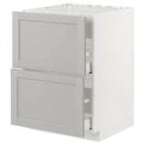 White ikea METOD kitchen cabinet with light grey drawers and smooth edges.