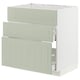 Modern ikea METOD kitchen cabinet with 3 green drawers.
