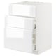 White METOD kitchen unit with glossy finish and integrated handles.