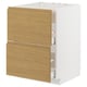 A minimalist kitchen unit in white and light oak. It two drawers with integrated handles and a sleek design. The unit is part of the METOD system.