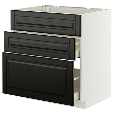 Modern kitchen cabinet in white with three black drawers, sleek design.