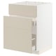 A METOD kitchen cabinet in beige with smooth surfaces and a modern design.