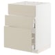 METOD kitchen unit in beige with three drawers and white frame.