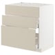 White METOD kitchen unit with beige drawers and smooth design.