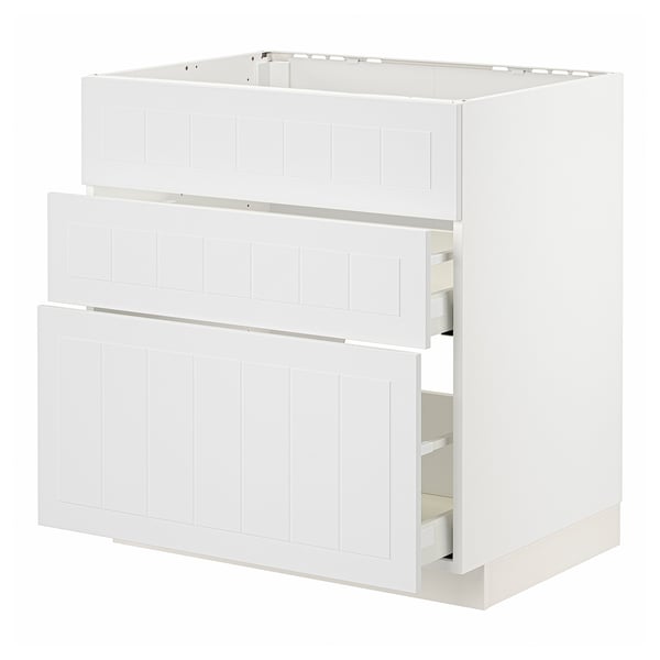 A white METOD kitchen cabinet with three drawers and a smooth, light design.