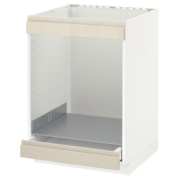 A white METOD kitchen cabinet with a beige voxtorp high-gloss drawer.