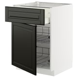 Modern kitchen unit, white and black. Open drawer and shelf space. Clean, organized design.