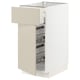 A white METOD kitchen cabinet with beige havstorp fronts, featuring multiple wire baskets and a smooth drawer.