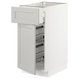 White kitchen cabinet with beveled light grey doors, wire shelves, metal drawer, and wooden construction.