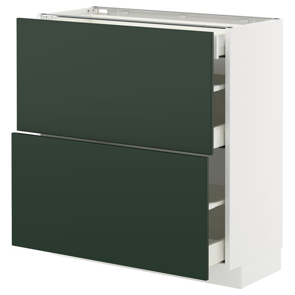 Ikea METOD kitchen unit, green drawer fronts, white base, rectangular.