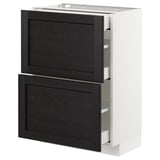 A white METOD kitchen cabinet with dark stained wood drawers, featuring beveled edges and a modern design.