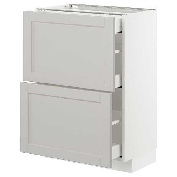 Modern white kitchen cabinet with two open drawers, sleek design, and beveled edges.