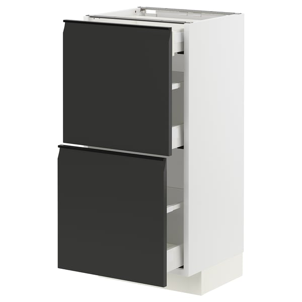 Modern white kitchen cabinet with sleek black drawers, minimalist handles, and integrated design.