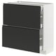Modern kitchen unit: METOD with black drawers, metallic handles.