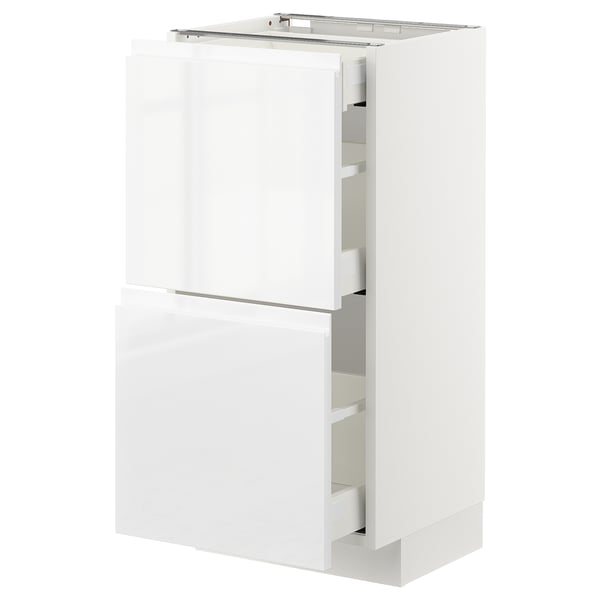 White high-gloss kitchen cabinet with drawers.