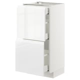 White high-gloss kitchen cabinet with drawers.