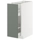 Open METOD cabinet in white with grey-green door. Modern design, sleek look, sturdy particleboard.