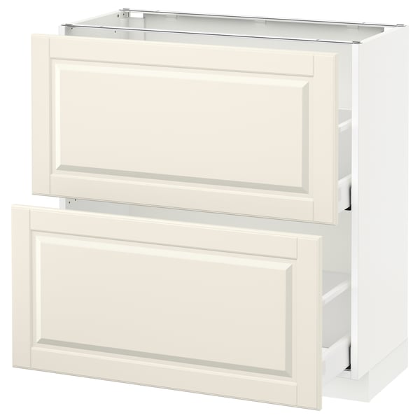 White kitchen cabinet with drawers, off-white color, rectangular shape, and classic design.