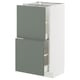 Modern kitchen unit with grey-green drawers and white frame, sleek minimalist design.