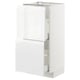 White METOD kitchen cabinet with high gloss and integrated handles.