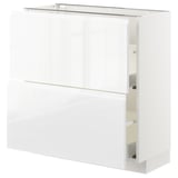White glossy METOD kitchen cabinet with sleek modern design, featuring smooth handles and sturdy frame.