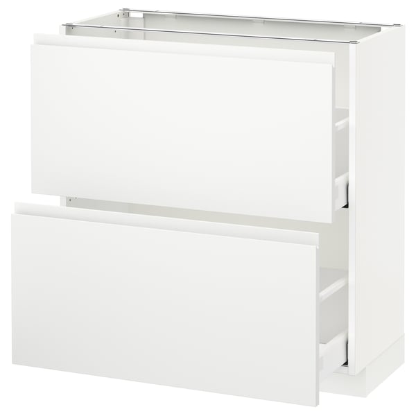 A white METOD kitchen cabinet with smooth drawers.
