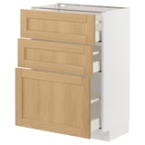 The METOD kitchen unit with light wood drawers and a white frame. It has three pull-out drawers with smooth-running mechanisms.