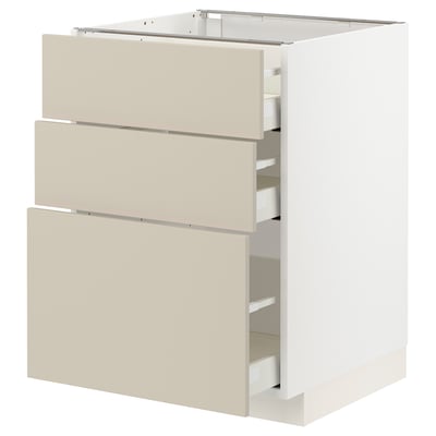 An ikea METOD kitchen cabinet with beige havstorp drawers, a clean and smooth design, equipped with self-closing drawers.