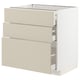 A white and beige METOD kitchen cabinet with three self-closing drawers in a modern, minimalist design.
