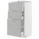 A white ikea METOD kitchen cabinet with light grey havstorp drawer fronts.