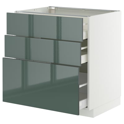Modern grey-green METOD cabinet with three smooth, self-closing drawers.