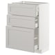 White METOD kitchen unit with beveled drawers and shelves.